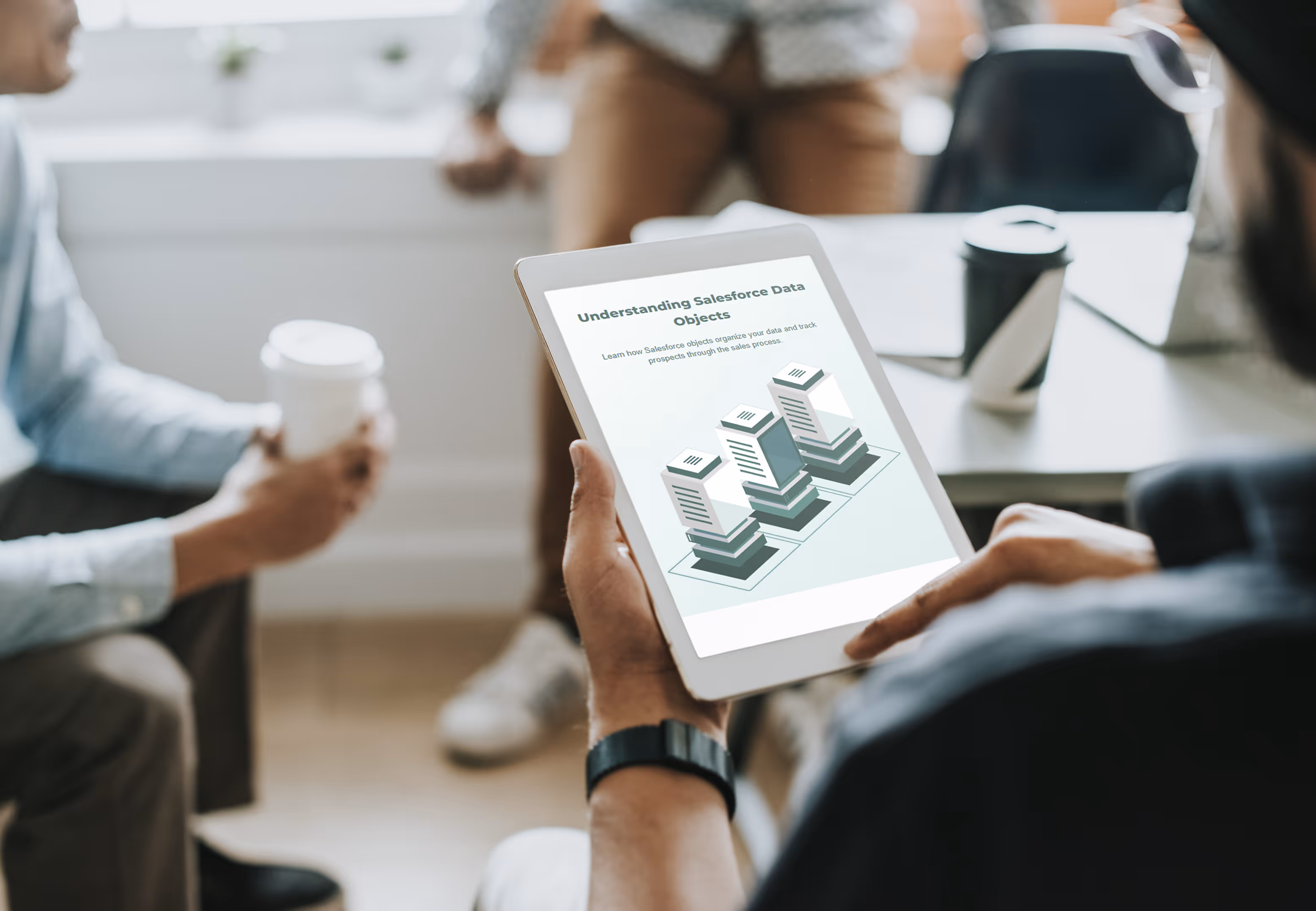 Close up photo of person viewing training on iPad.