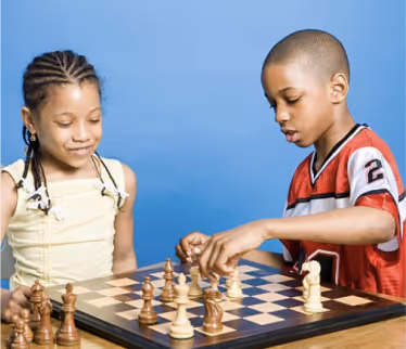 Students playing chess
