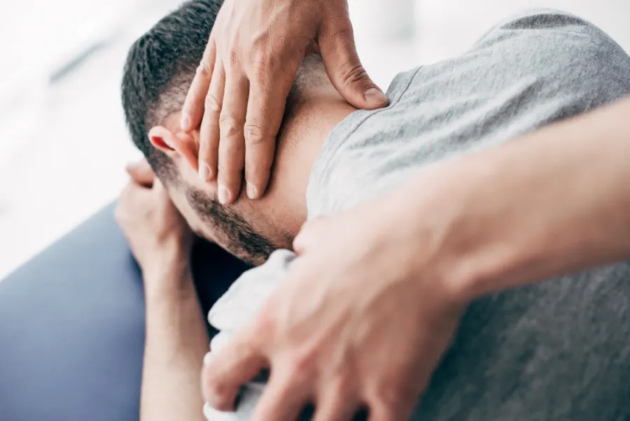 Chiropractor performing joint mobilization at Allied Healthcare in Westminster, CO