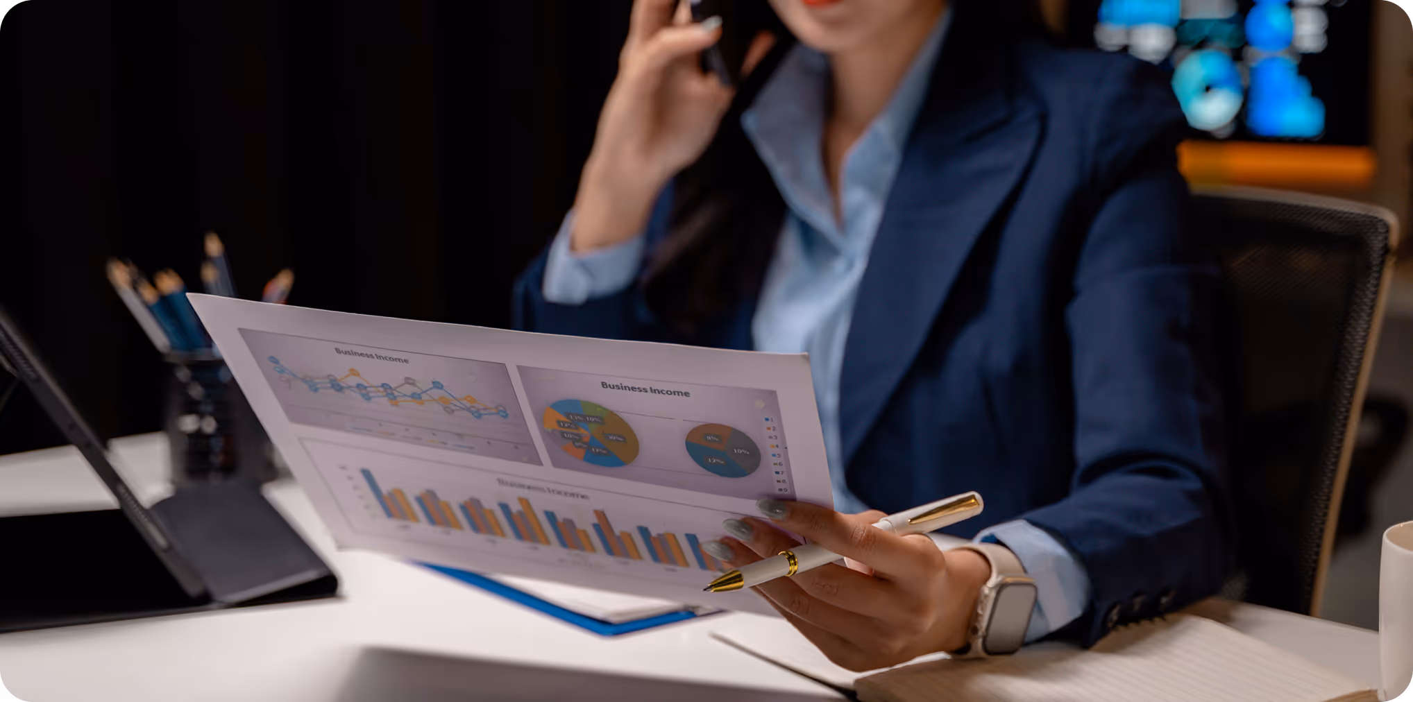 Expert checking clients financial records dring a call with them