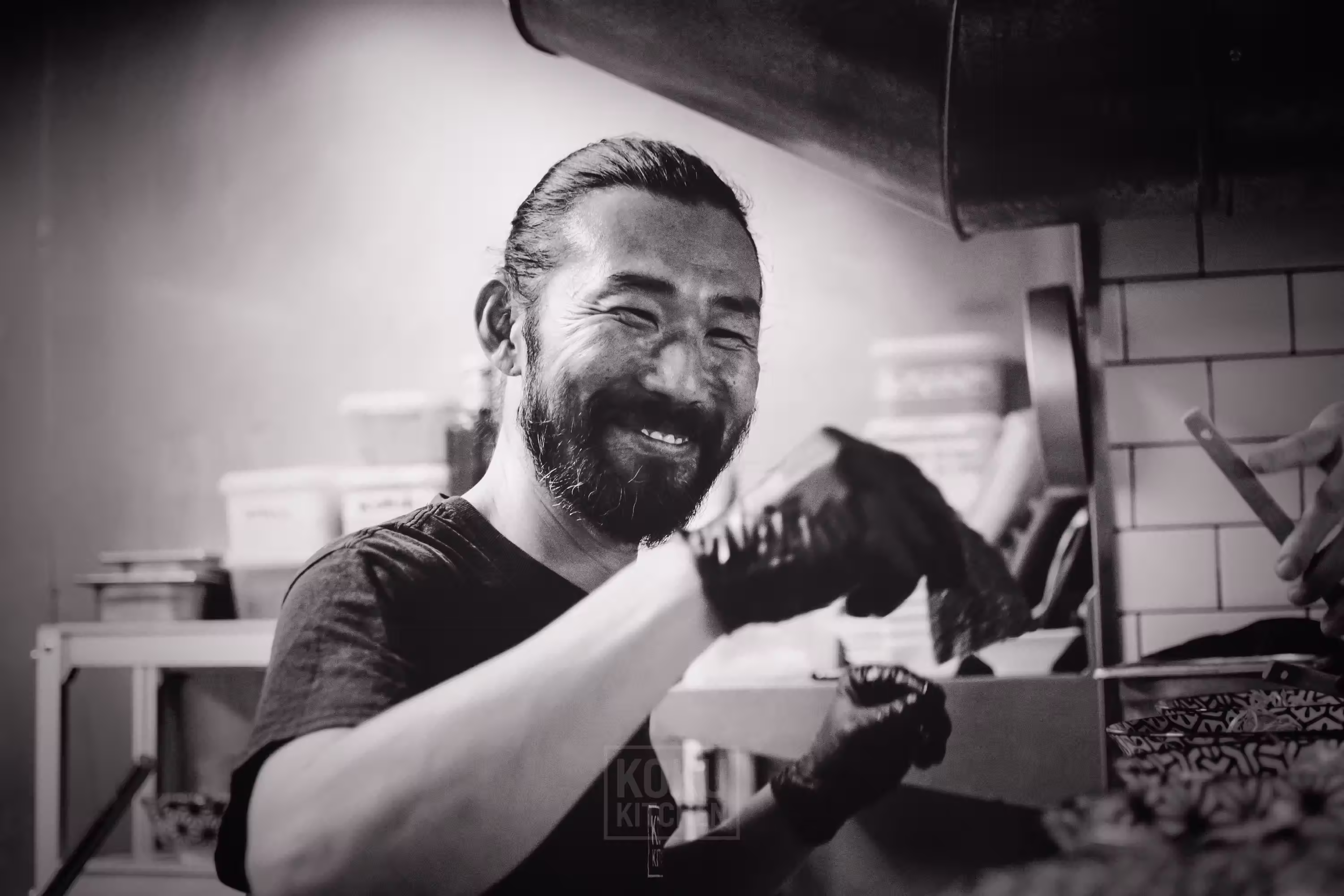 restaurant chef smiling at the camera