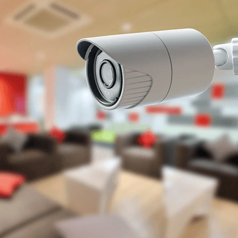 A wall mounted security camera.
