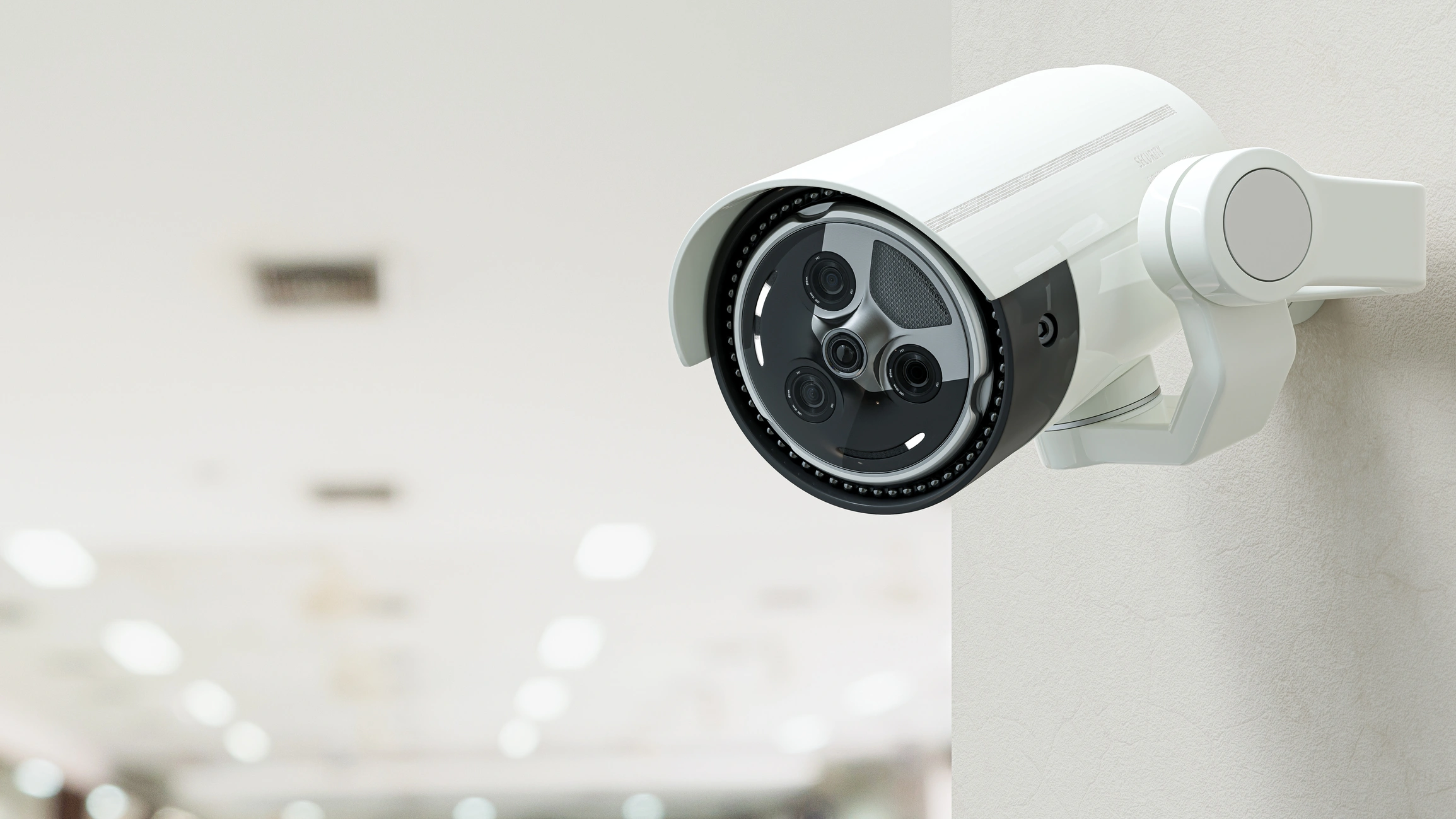 A wall mounted security camera.
