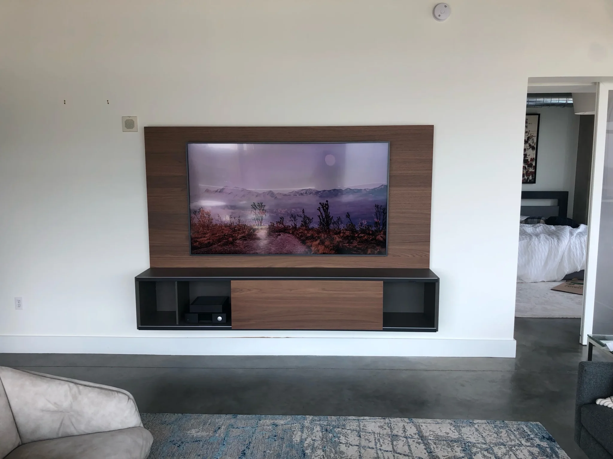 A stylish wall mounted TV installation.