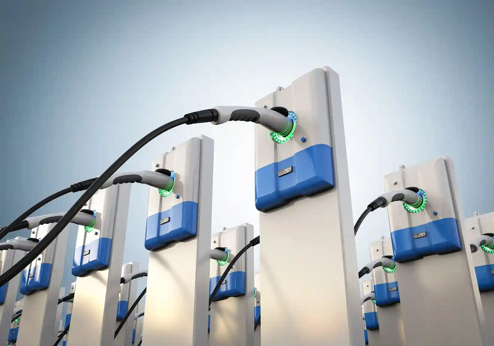 Abstract row of modern EV charging wall units with plugs and glowing green lights.