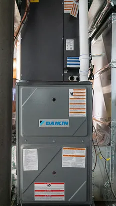 Daikin furnace installation in a residential setting, showcasing energy-efficient heating technology and service reliability.