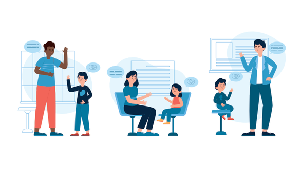 A table surrounded by people, where one individual is conversing with another, while others listen attentively.