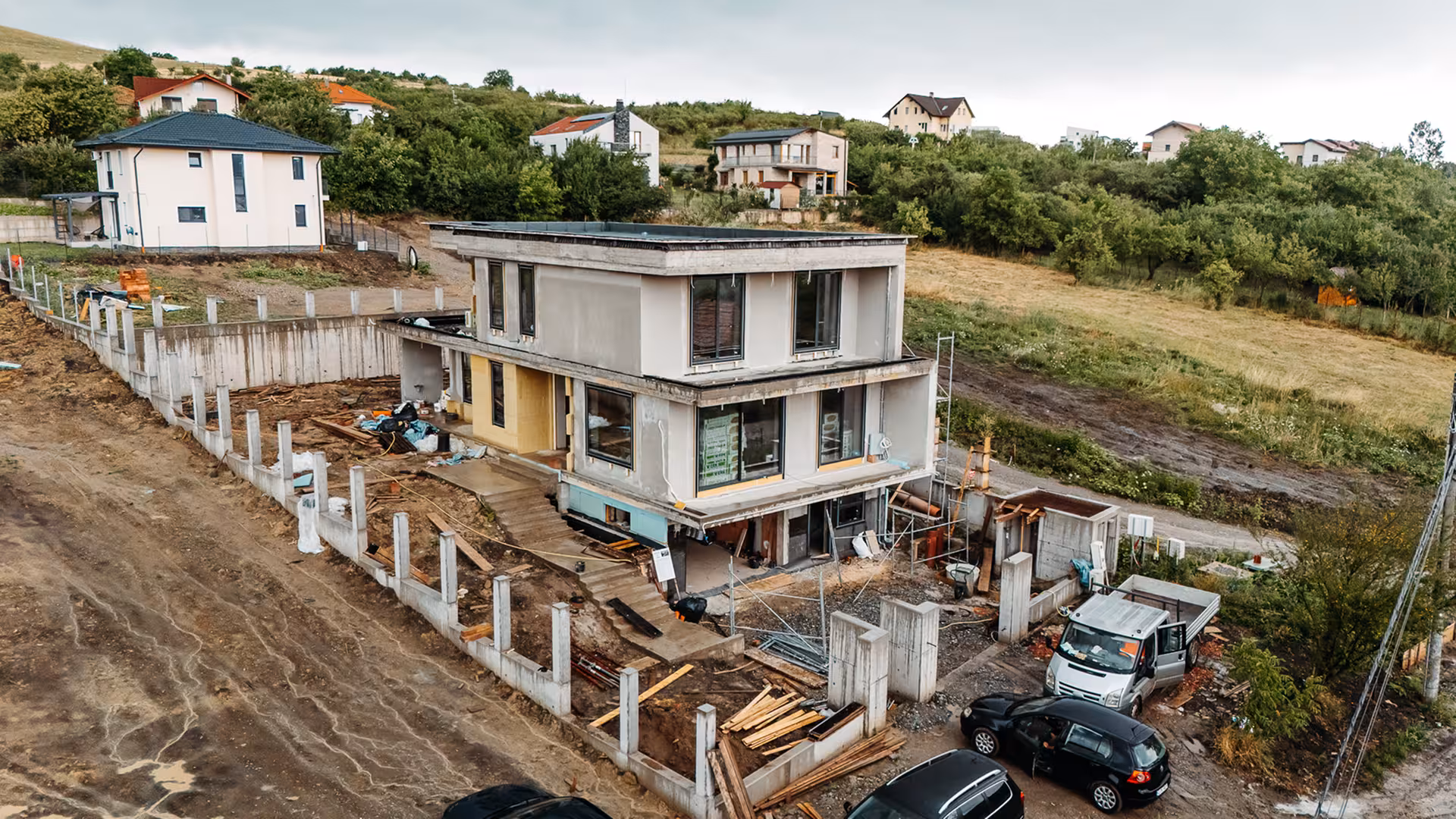 Cortizo COR 80 HO aluminium joinery with Vision Plus sliding doors, curtain wall and burglar-proof laminated glass, professionally fitted to passive house standard.