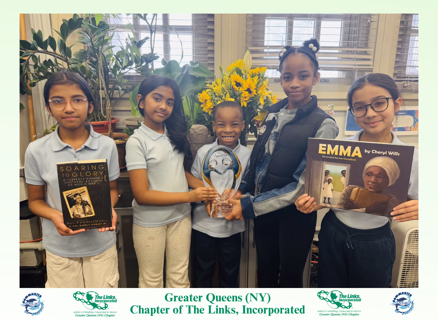 Five students holding books and award from The Links Incorporated