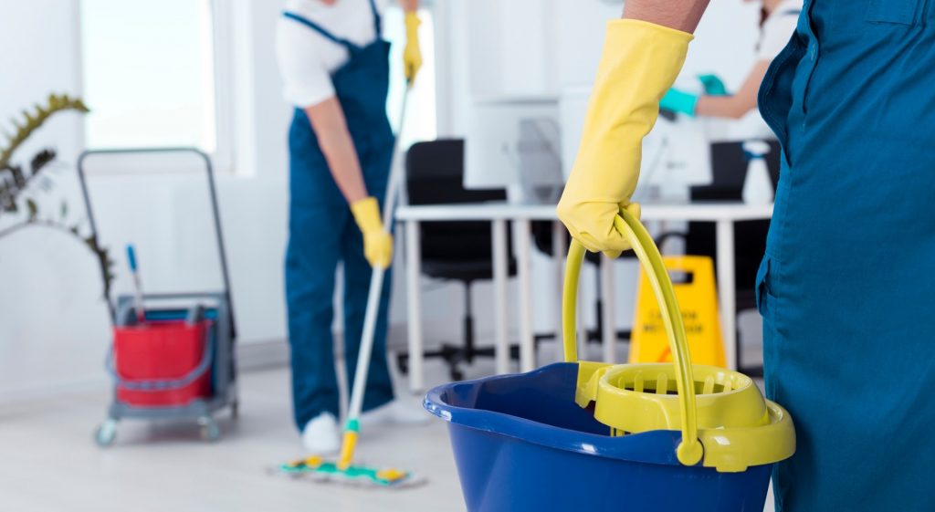 cleaning crew working on a janitorial  office 