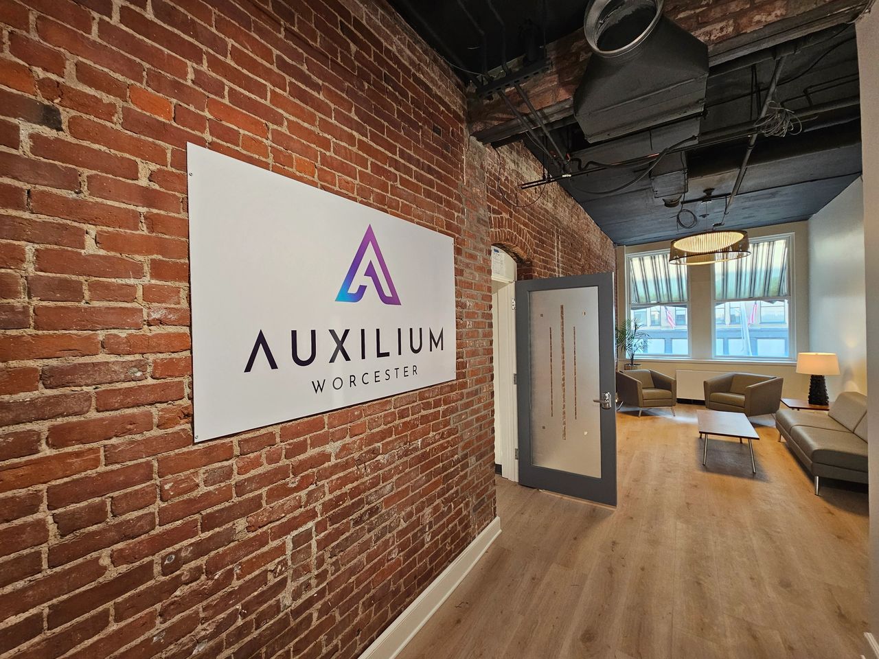Auxilium Worcester’s freshly renovated accelerator space at 311 Main St. features co-working areas and private offices designed to support early-stage innovation (photo submitted)