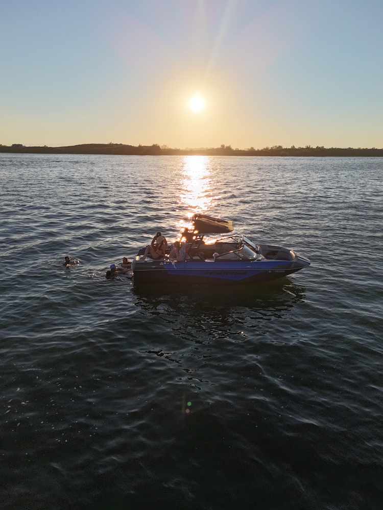 Drone photograph of a boat during sunset