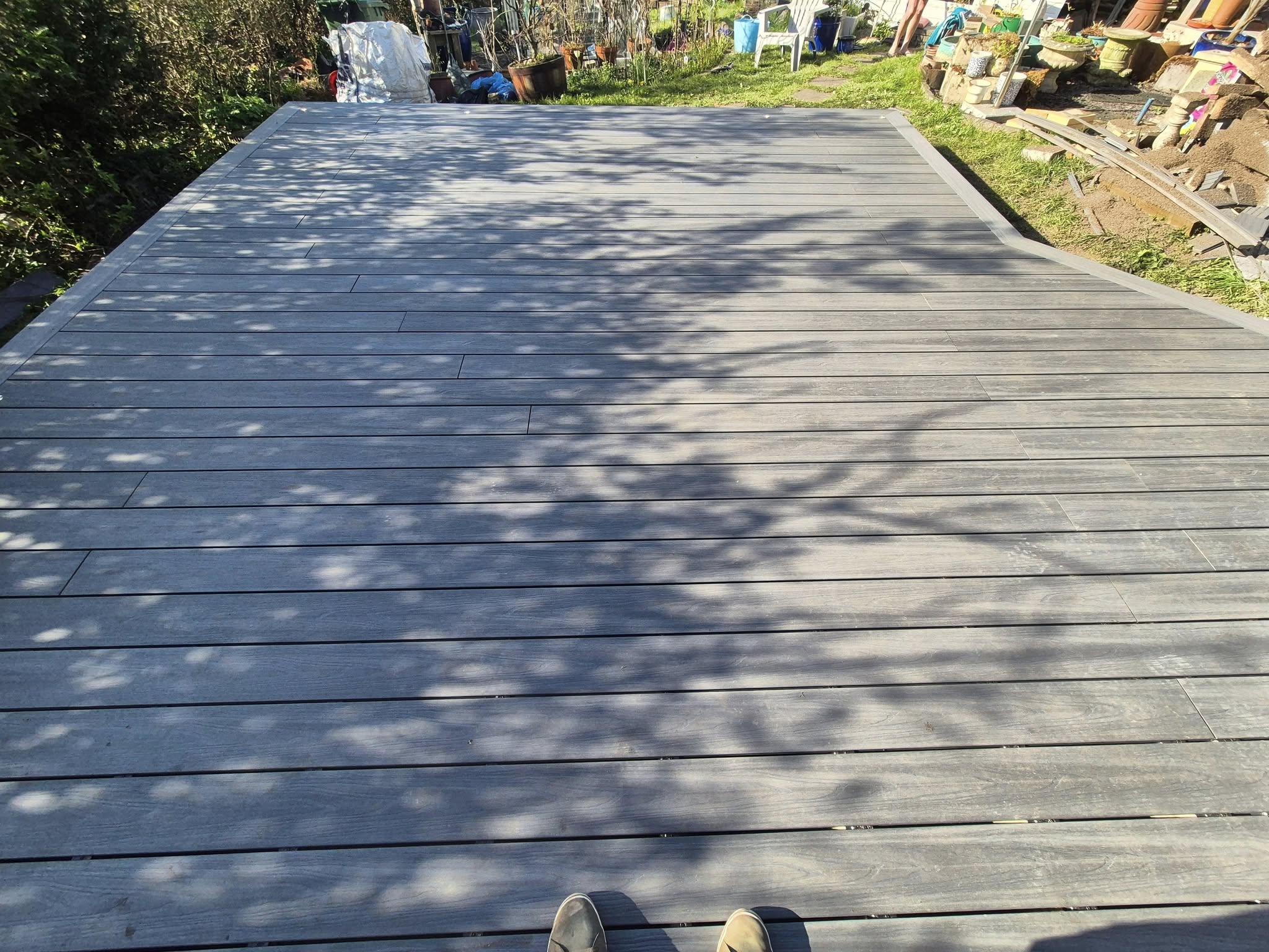 Wide view of finished composite deck, clean surface and sharp lines.