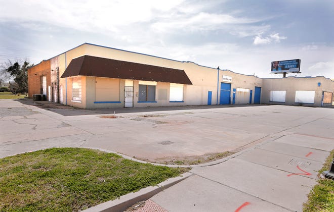 The former Cleary's service station was boarded up years before it was purchased and redeveloped into a health clinic and grocery.