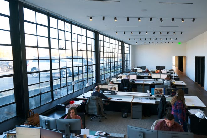 Original casement windows date that back to when the building was a Chrysler dealership were blocked in for decades but reopened as part of a recent renovation. The former parts department space is now home to Gardner Architects.