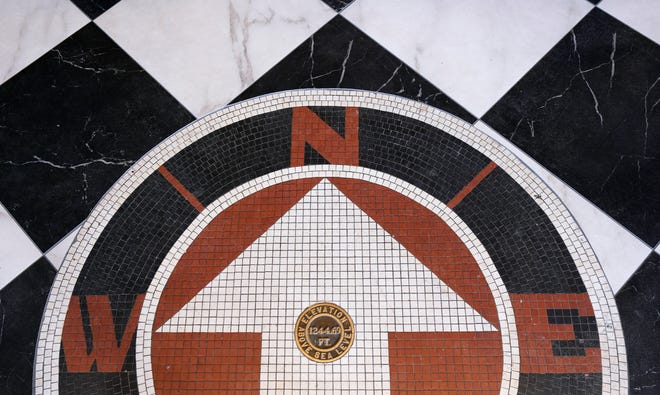 Original floor seal inside Harvey Bakery when it was a Chrysler dealership.