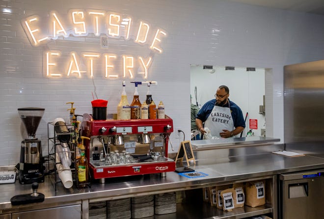 Dante Manson works in the Eastside Eatery kitchen inside the new Market at Eastpoint located at 1708 NE 23. The kitchen, which will include some inside and outside dining, will serve breakfast and lunch and take-out meals.