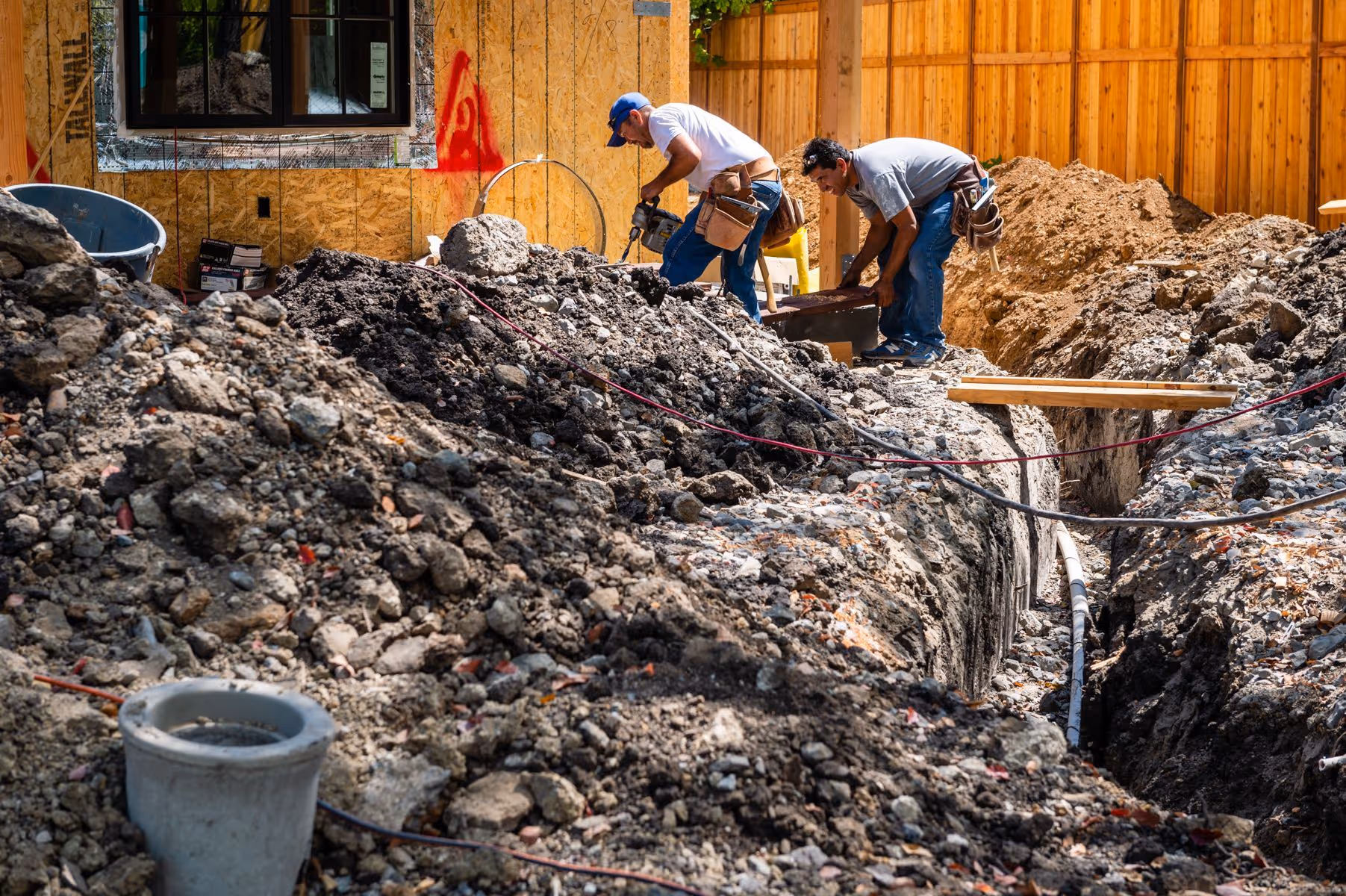 Picture of Construction Site, Two Men Digging a Trench