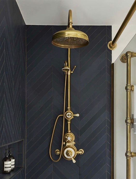 Waterworks exposed shower system in brushed gold finish by Terentti