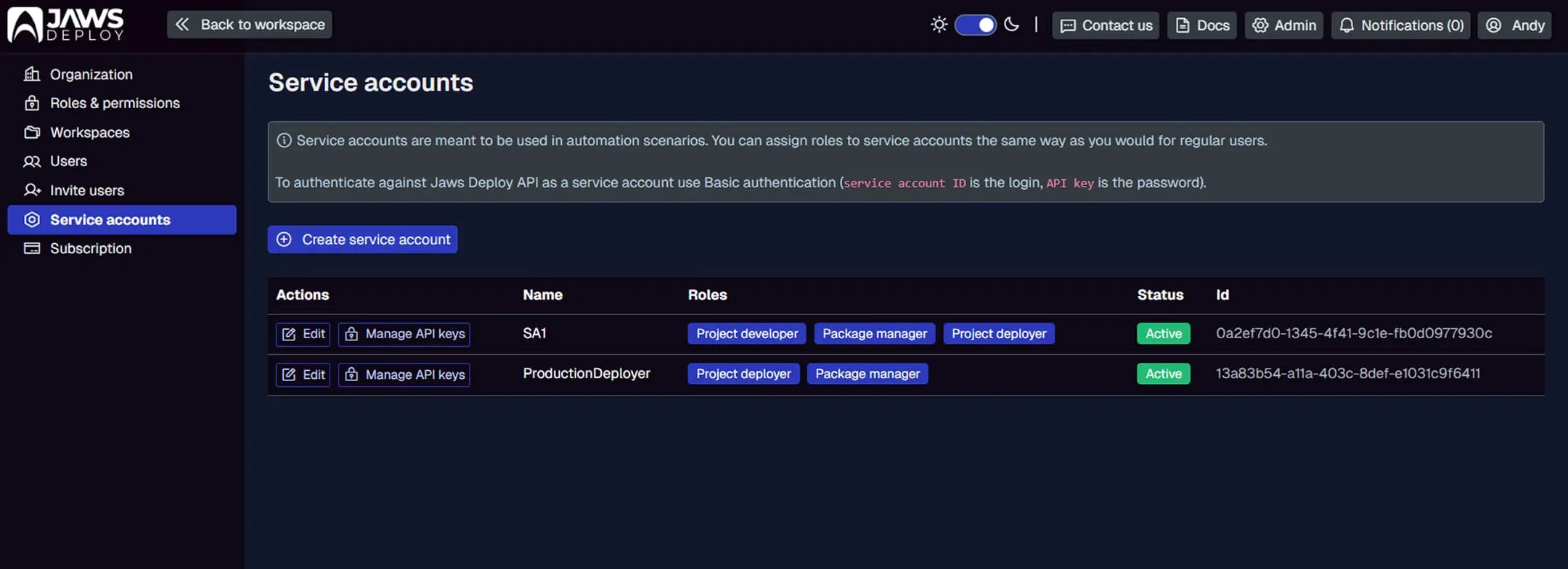 Service accounts management dashboard in Jaws Deploy, showing active automated accounts like 'ProductionDeployer' with assigned roles and unique system IDs for API-driven deployment auditing.