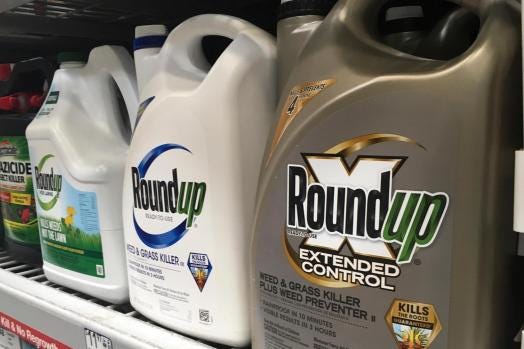 FILE – In this Feb. 24, 2019, file photo, containers of Roundup are displayed on a store shelf in San Francisco. (AP Photo/Haven Daley, File)