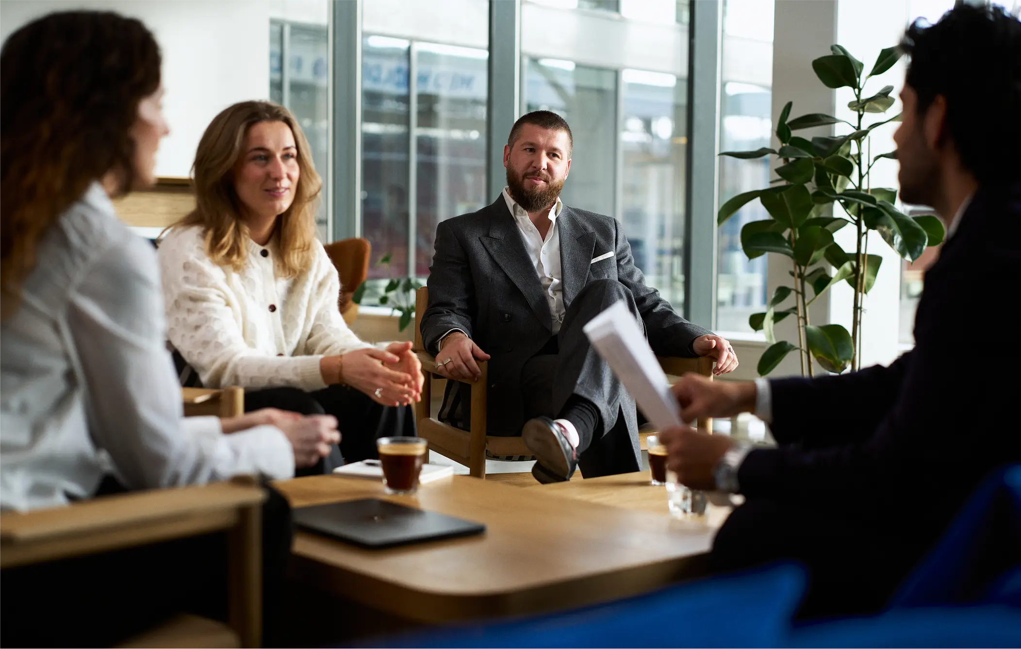 People sitting around having a meeting