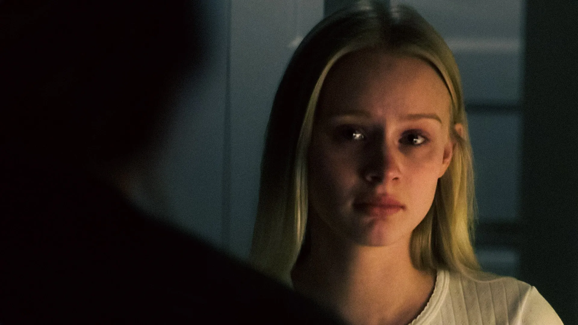 Alice Trulsson as her character in "Wherever You Go", captured in a contemplative moment from the film.