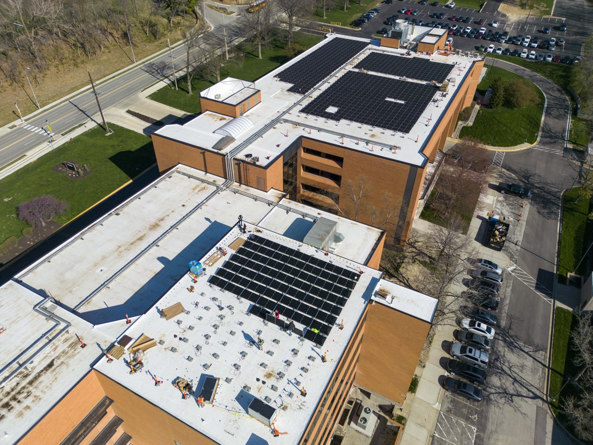 Aerial view of Lifetime Solar commercial rooftop solar installation on large building