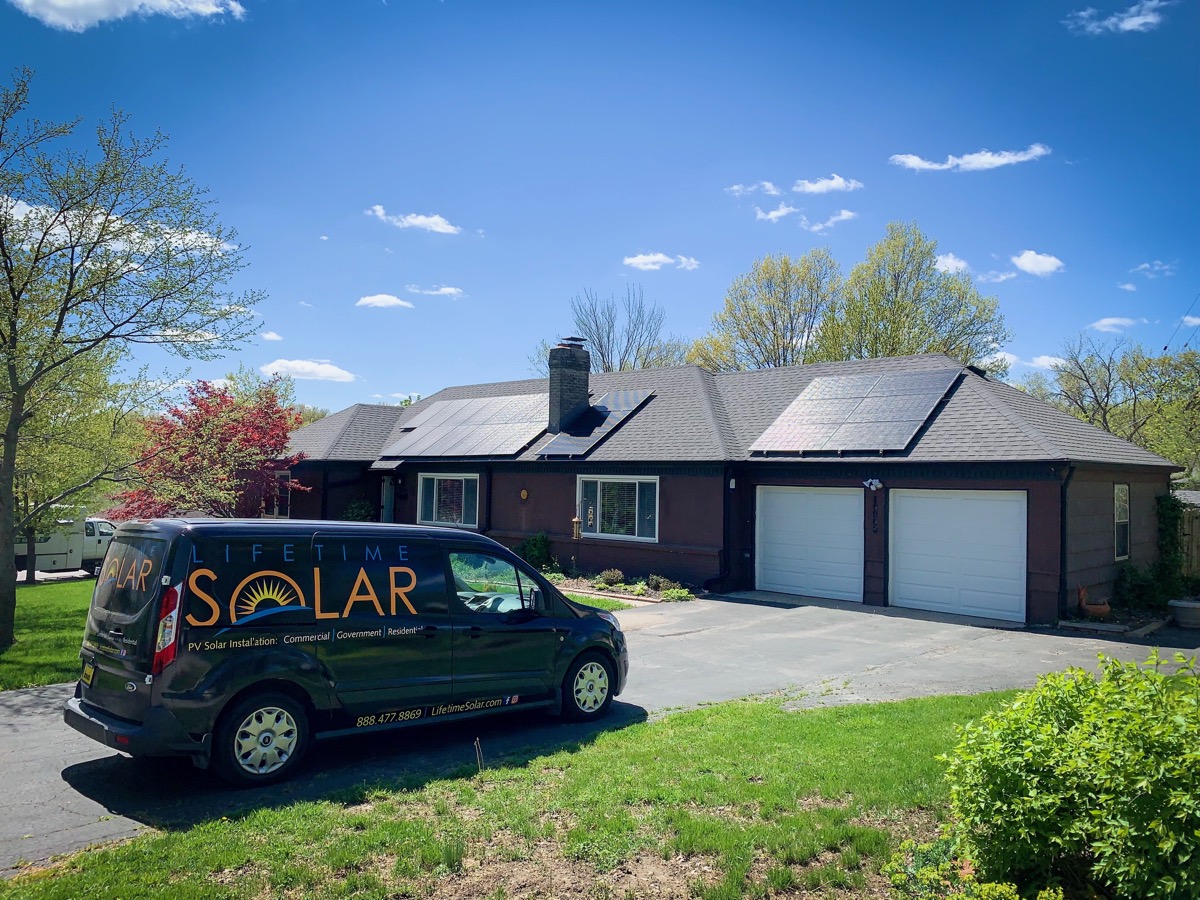 Lifetime Solar van in front of completed residential solar installation in the Midwest