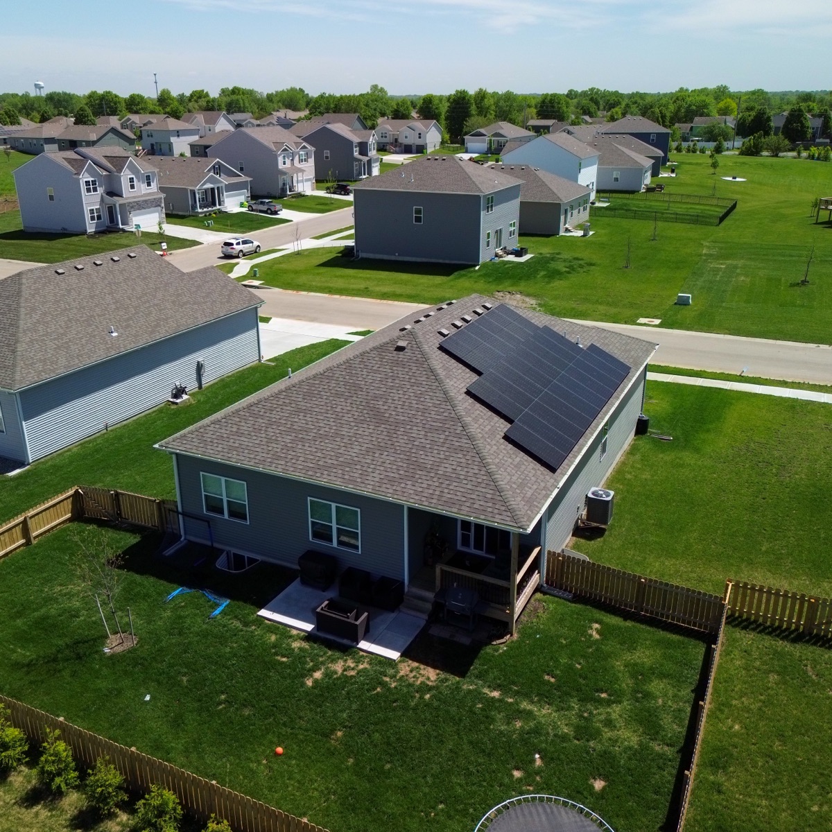 Large ground-mount solar panel array installed by Lifetime Solar in the Midwest
