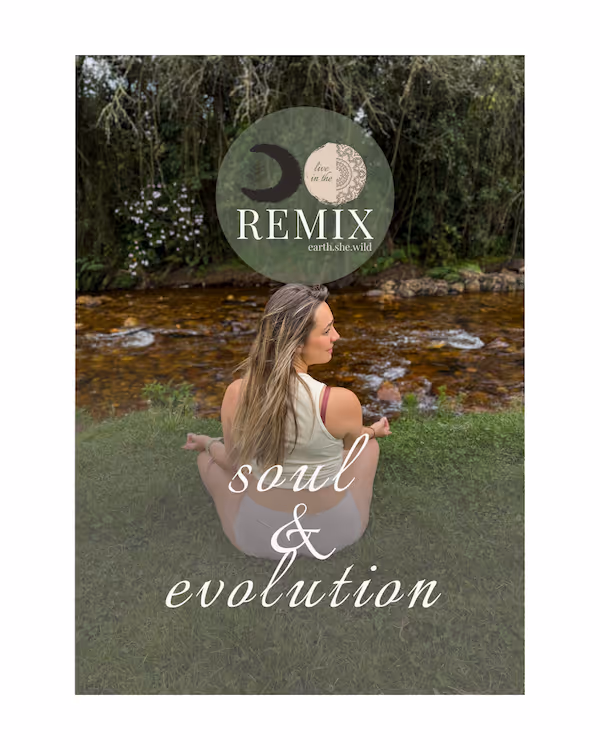 Woman sitting cross-legged on grass by a flowing river, with text 'REMIX earth.she.wild' and 'soul & evolution' overlayed.