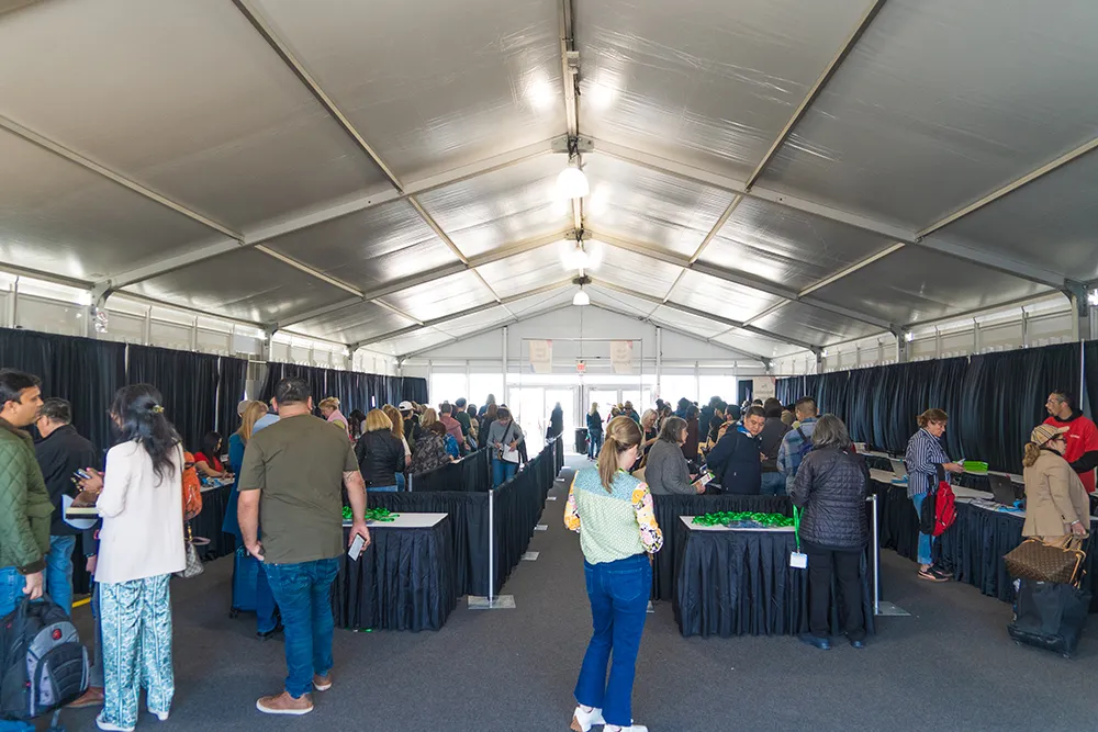 Buyers signing in at the GLW Holidome Tucson Gem Show reception center
