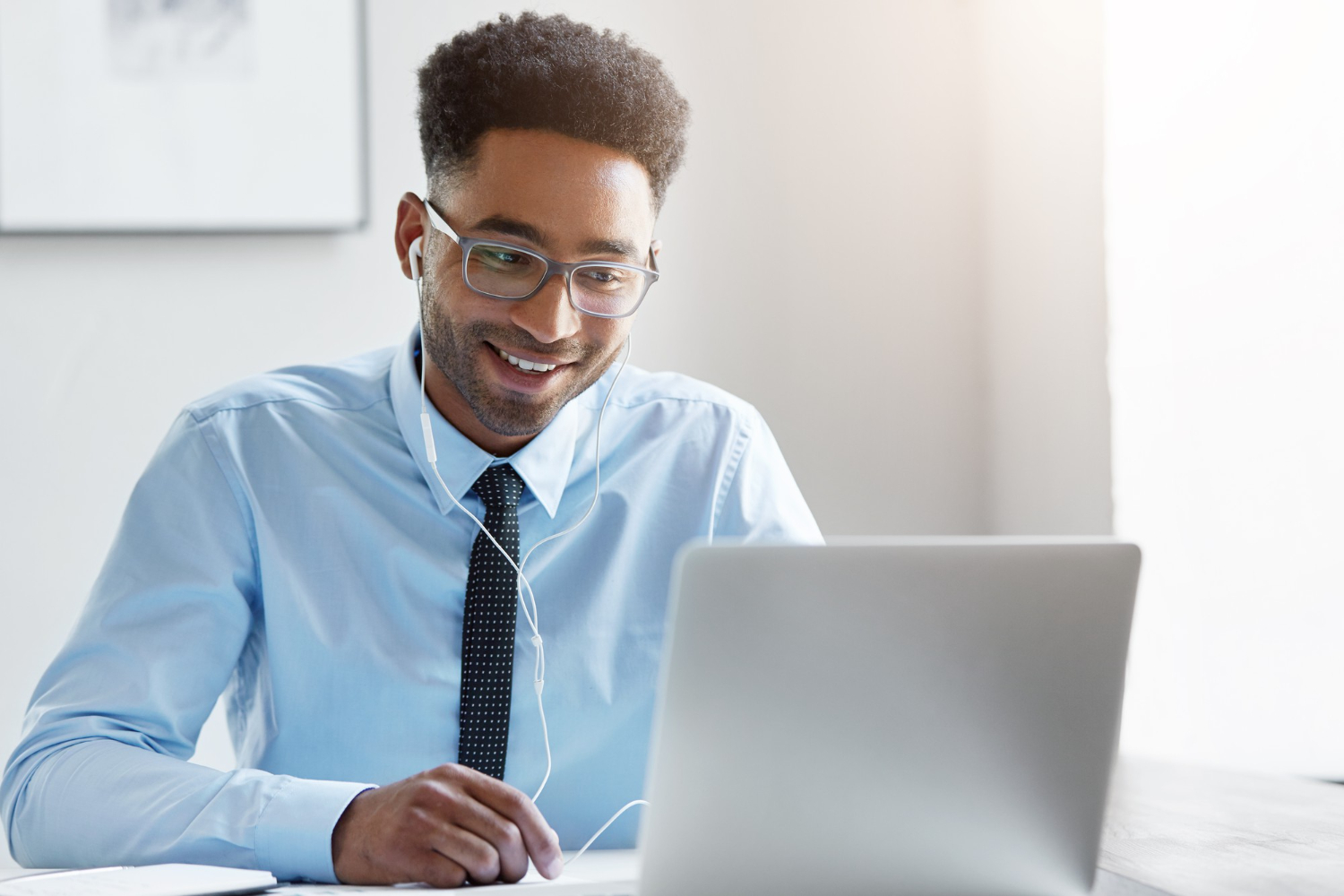 confident-businessman-working-his-laptop.jpg