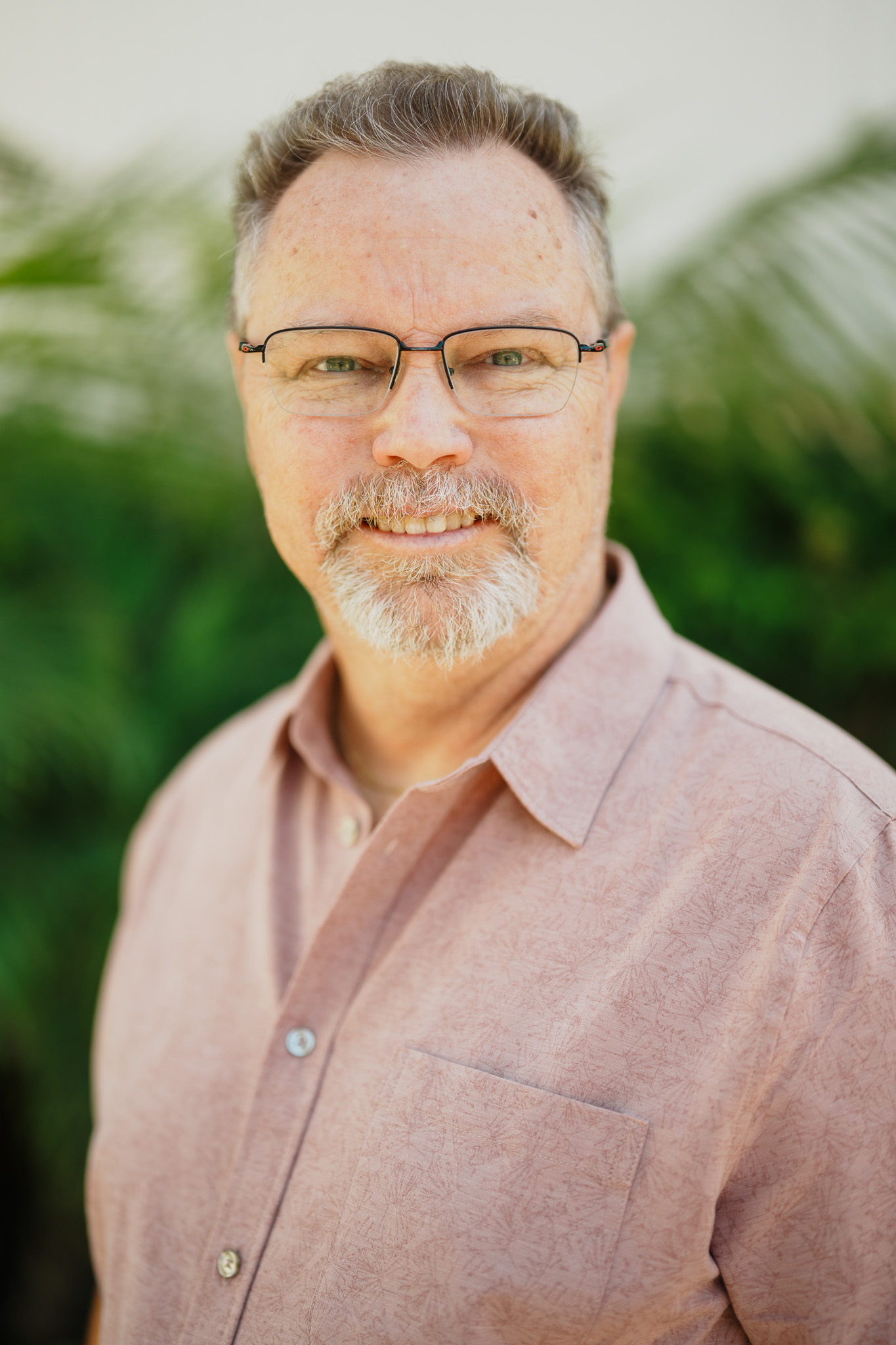 A color portrait of Kasey Segraves, smiling and ready to help you with your tech needs.
