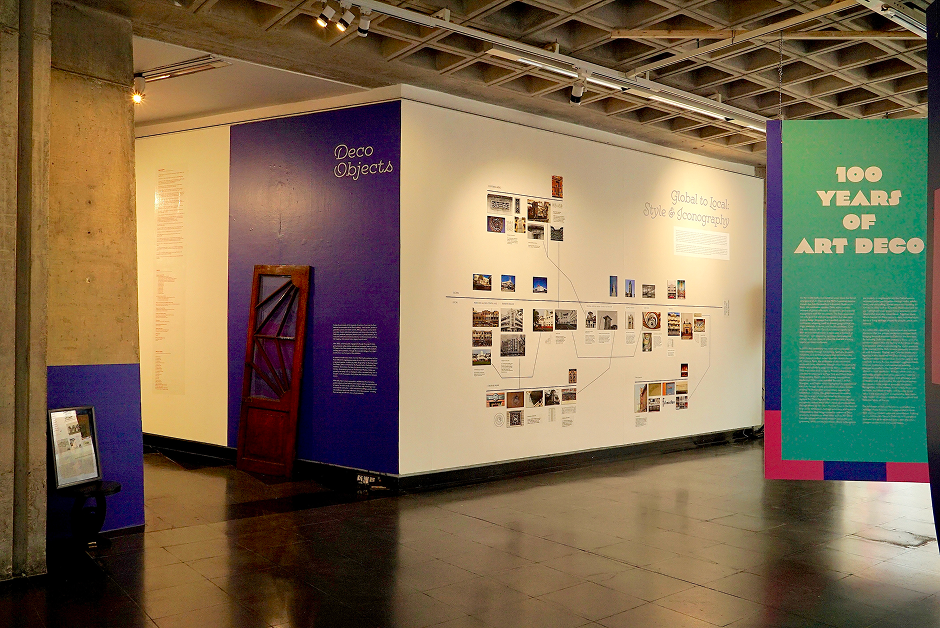 Exhibition display from Deco in Delhi with different panels showing 100 years of art deco in India
