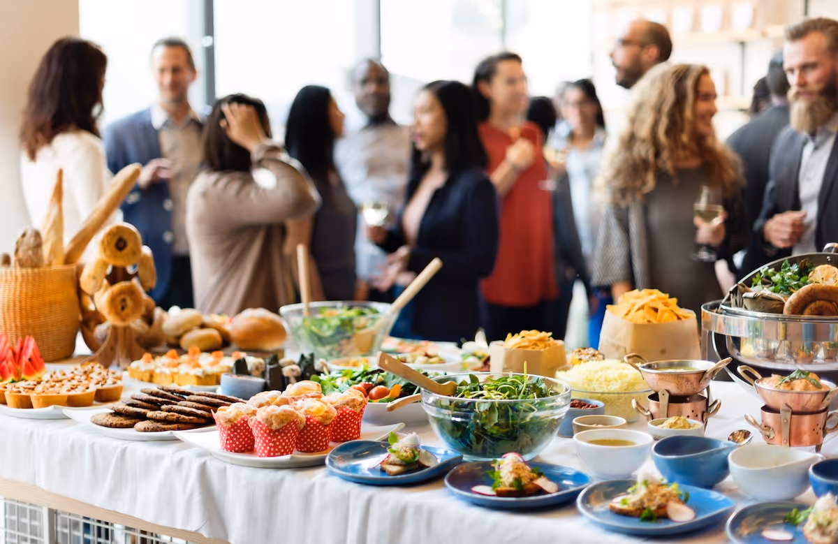 Corporate event with salads and gourmet bites catered by Exquisite Delites in Atlanta.
