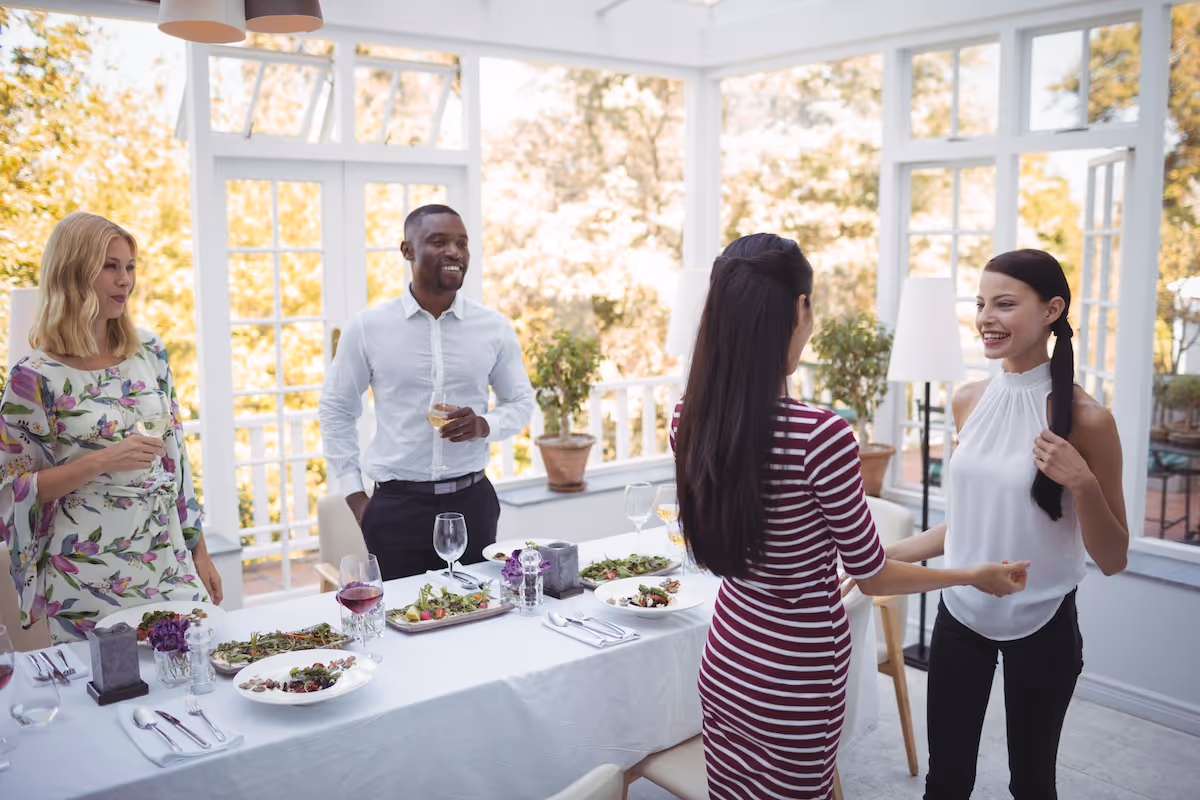 Colleagues networking over a catered business lunch by Exquisite Delites, Atlanta.
