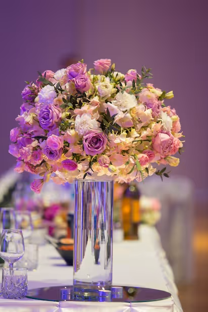 Pink and purple rose centerpiece by Exquisite Delites for luxury events in Atlanta.