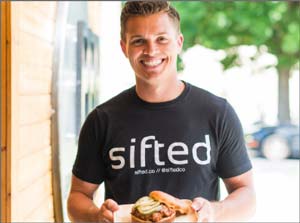 A smiling staff member