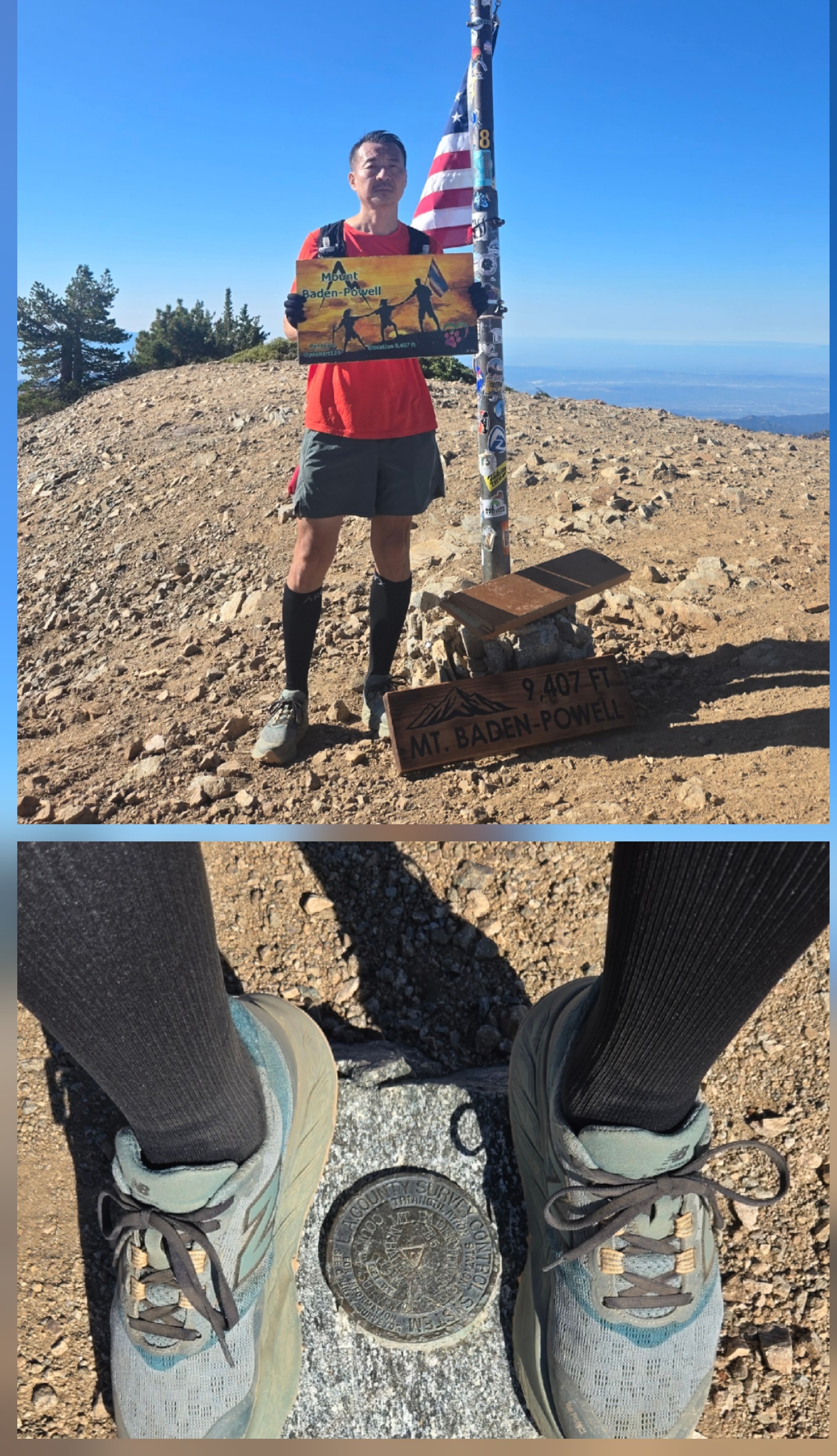 Hiker standing at Mt. Baden-Powell summit holding a yellow summit sign with silhouetted hikers and elevation text, wearing New Balance Hierro v9 trail shoes, red shirt, gray shorts, and black calf sleeves, next to a sticker-covered pole with an American fl