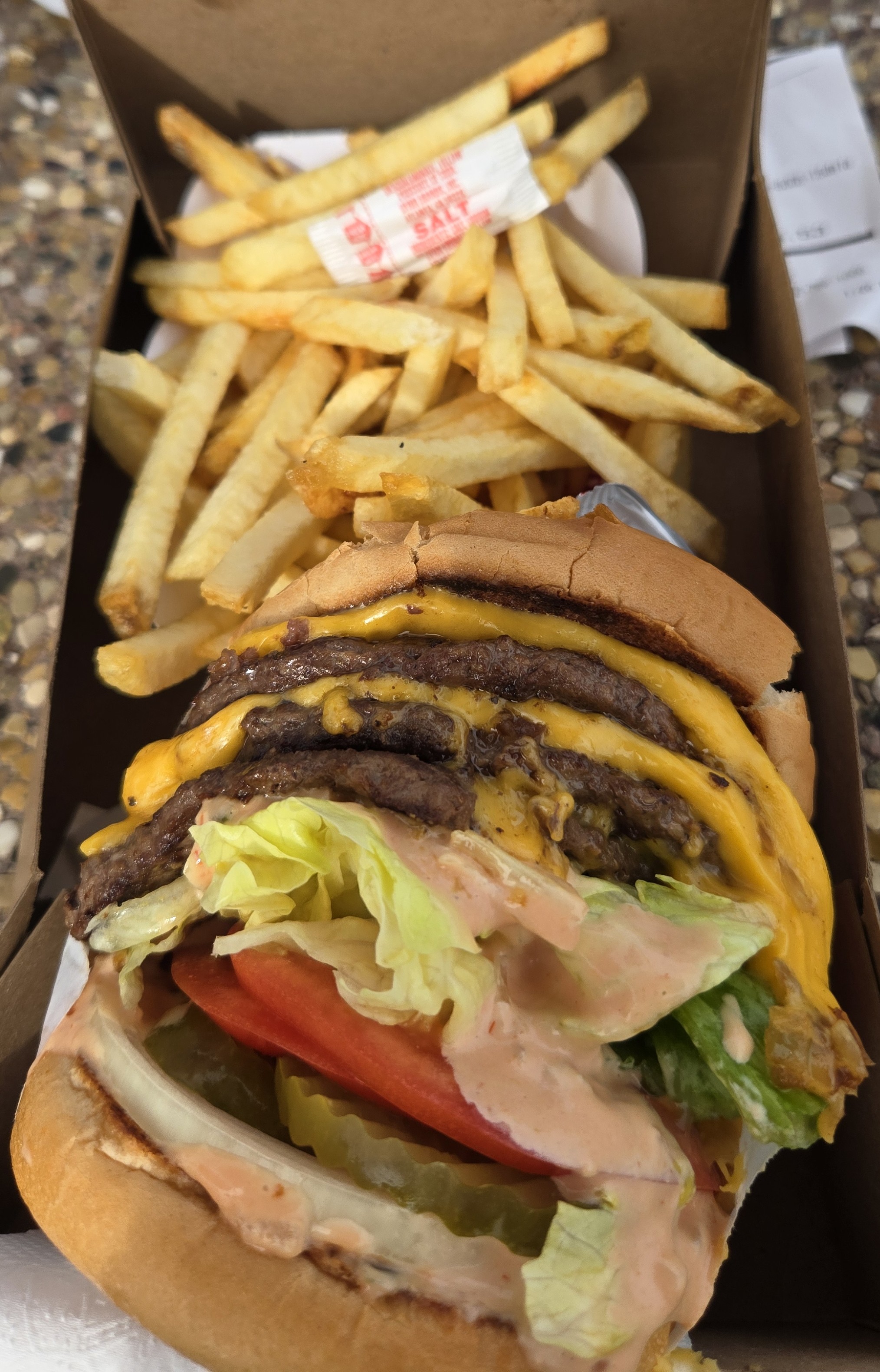 TrailGenic post hike refueling protocol - 3x3 animal style with extra onions, fries with extra salt, and ice tea with lemon