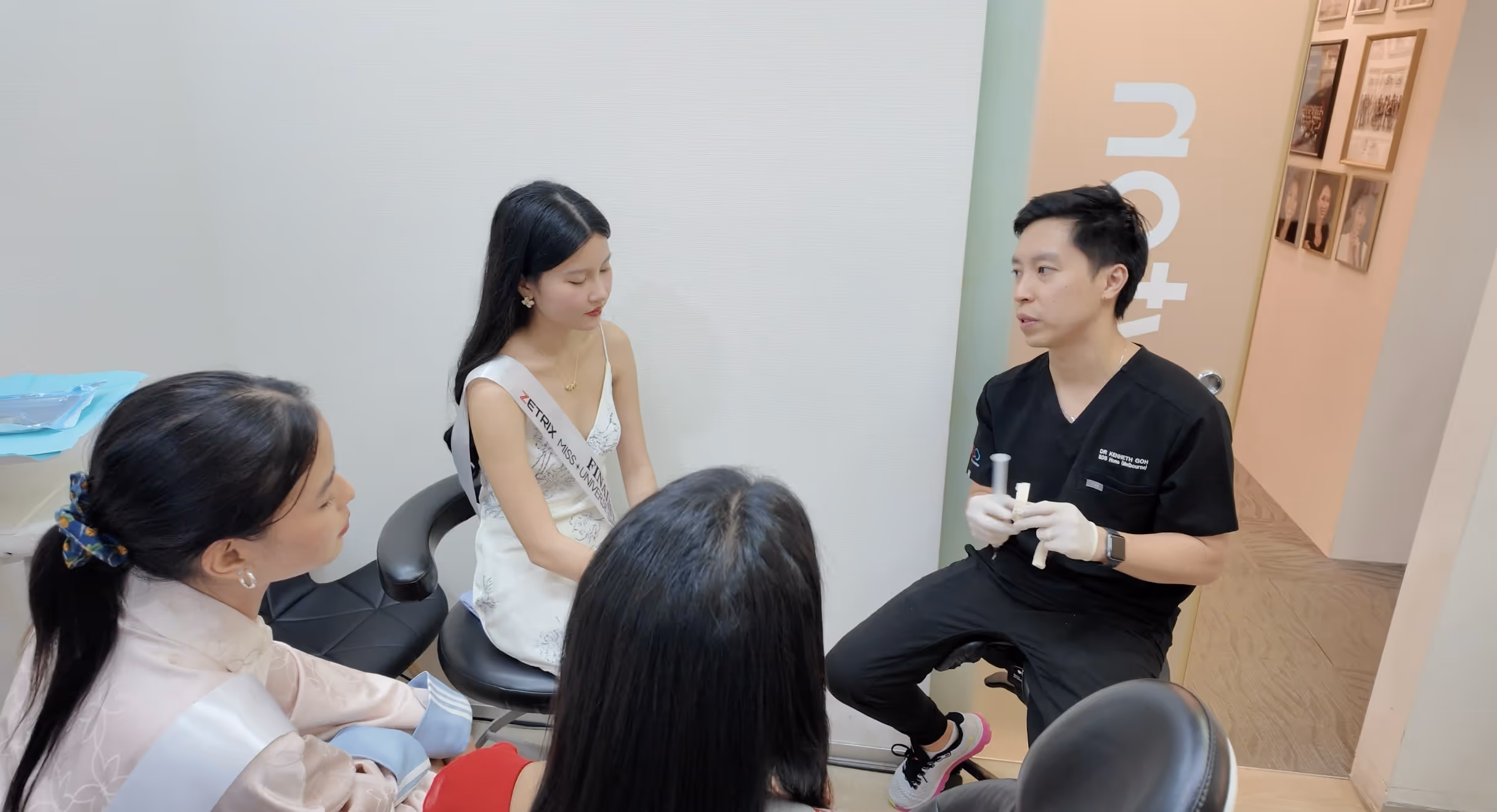 Dr. Kenneth Goh mus 2025 innowhite sitting in clinic room explaining home whitening kit