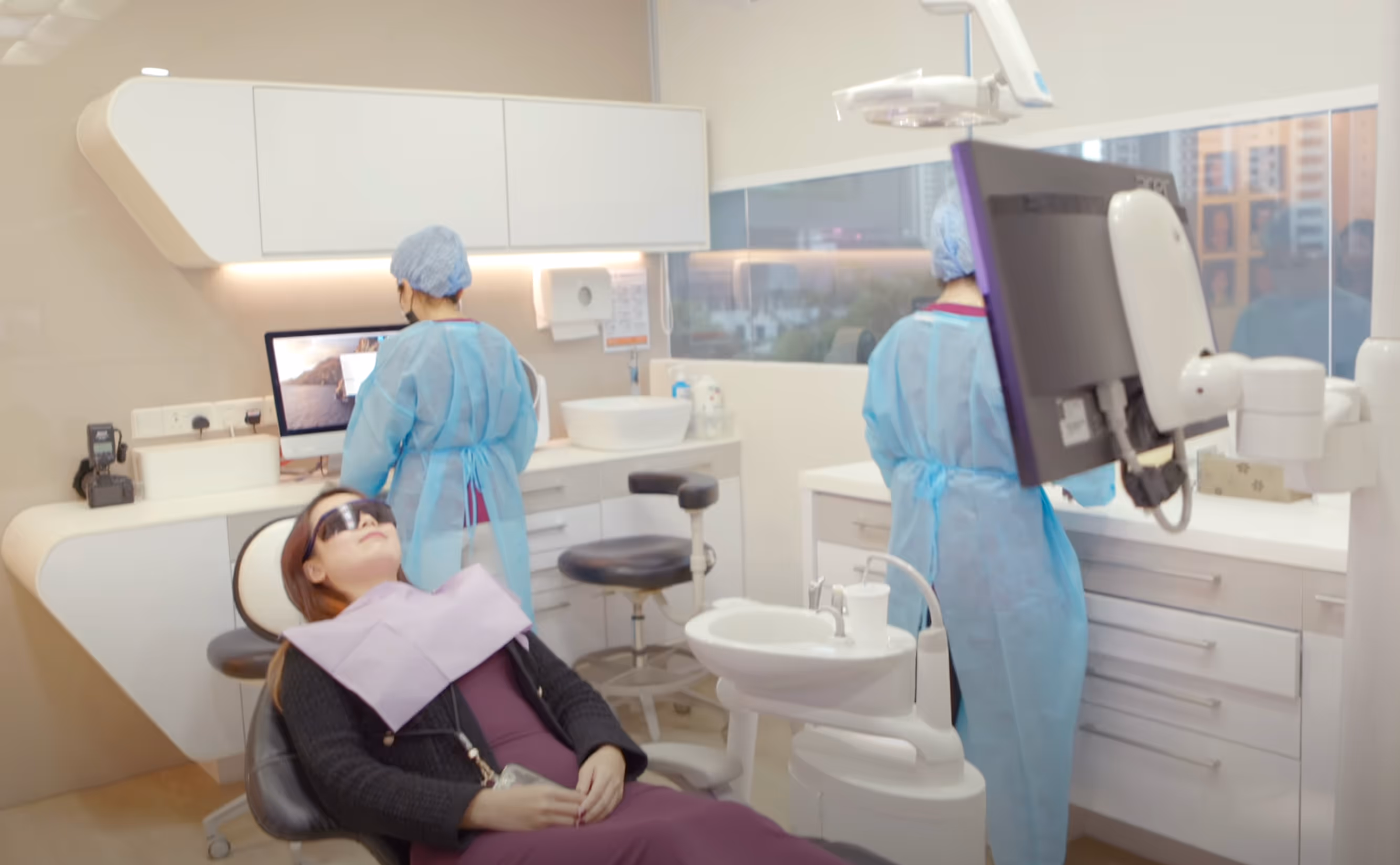 patient in chair clinic room dsa working