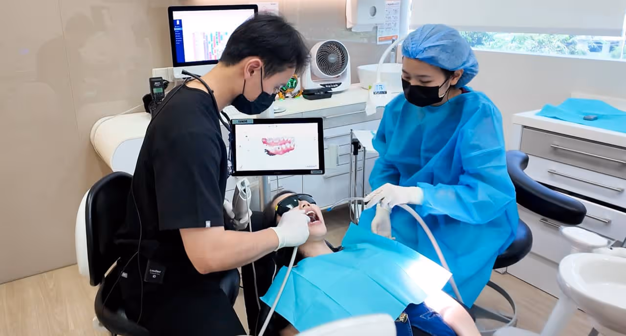 Dr. Martin Nguten, Dentist at Orchard Scotts Dental, performing an iTero scan