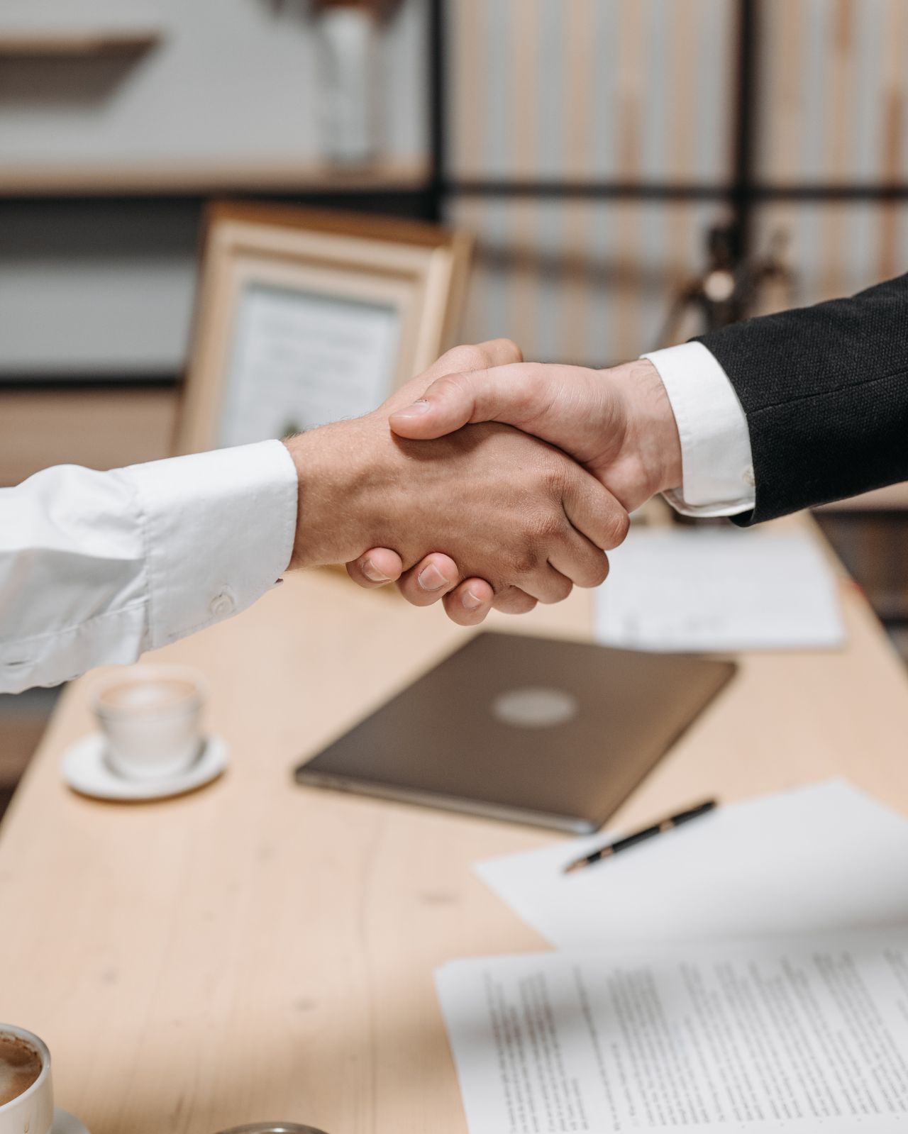 Photo of People shaking Hands