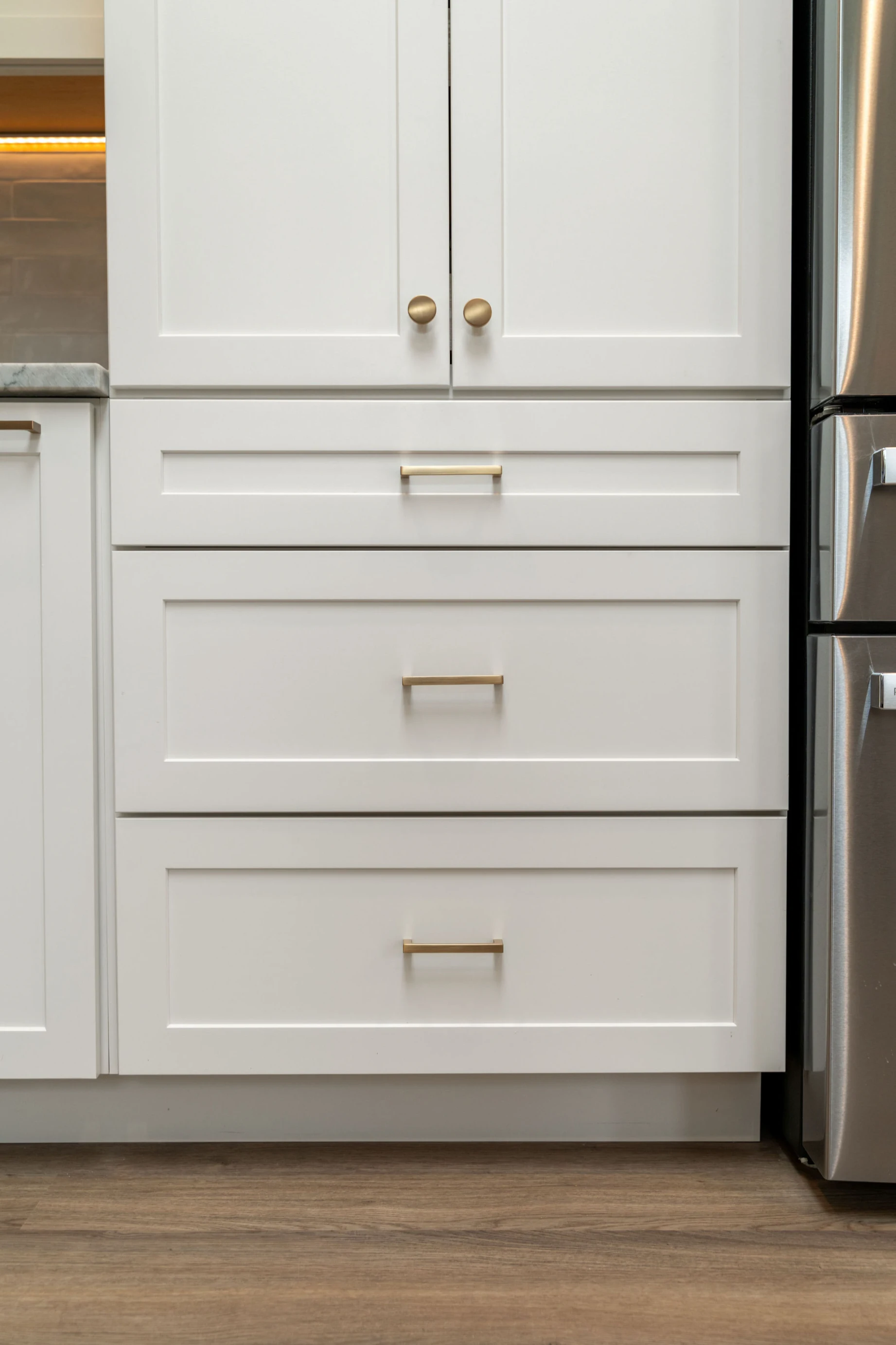 Bellevue dining area after Phase 2 remodel with practical storage and refined finishes