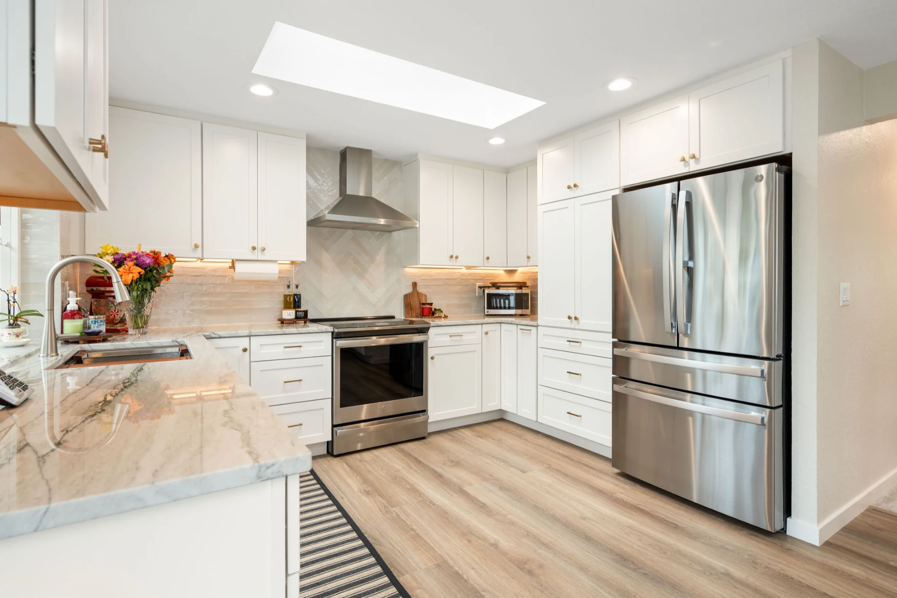 Bellevue kitchen renovation featuring new cabinetry and countertops using CFM Tile and Arizona Tile stone
