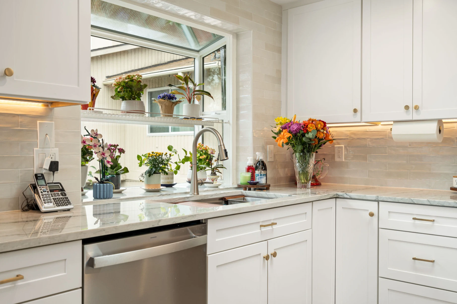 Bright modern kitchen in Bellevue home after full gut remodel with new cabinetry and countertops