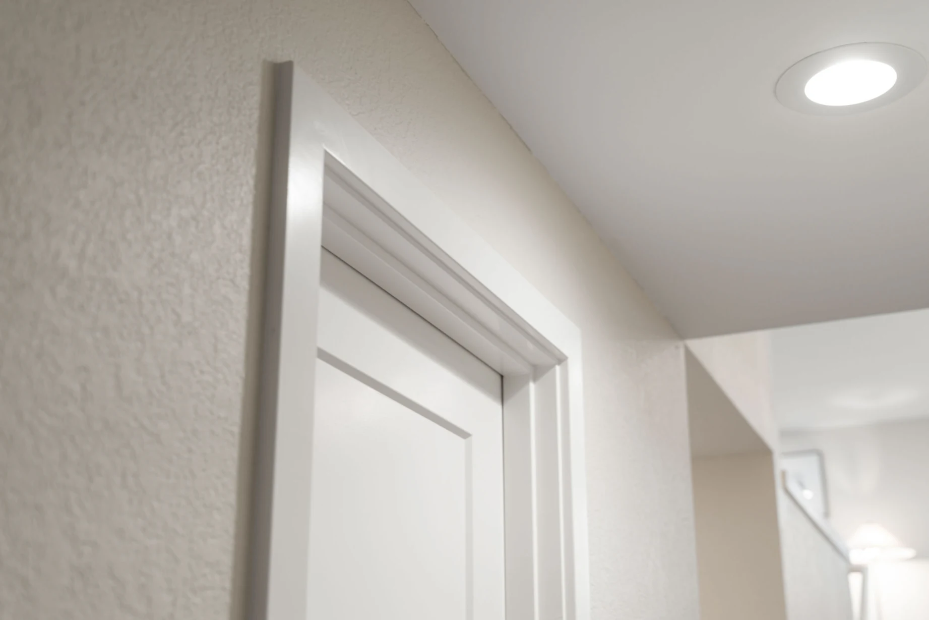 Refreshed interior door painted light tone after Bellevue home renovation