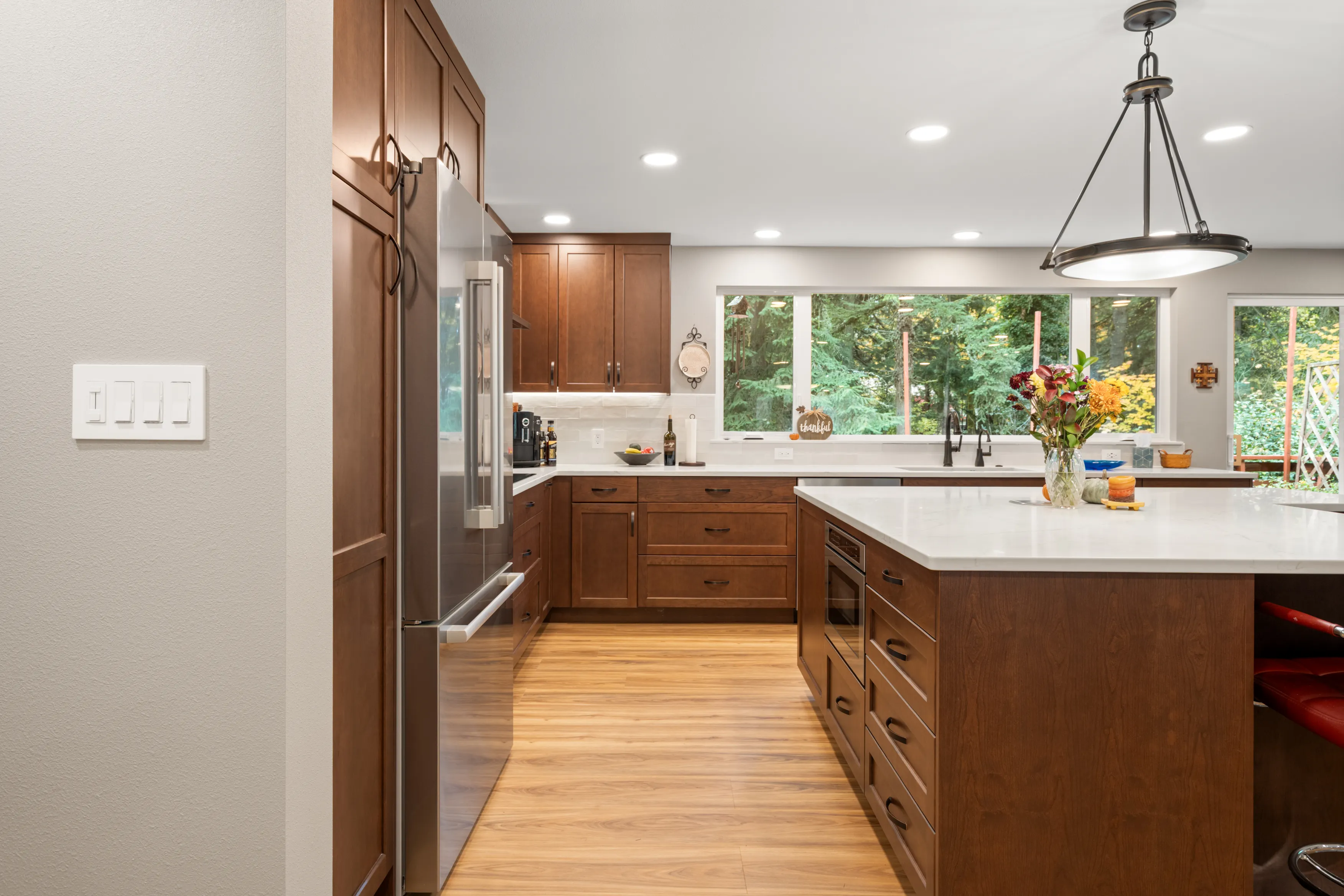 Bellevue kitchen remodel after wall removal with island and open dining layout